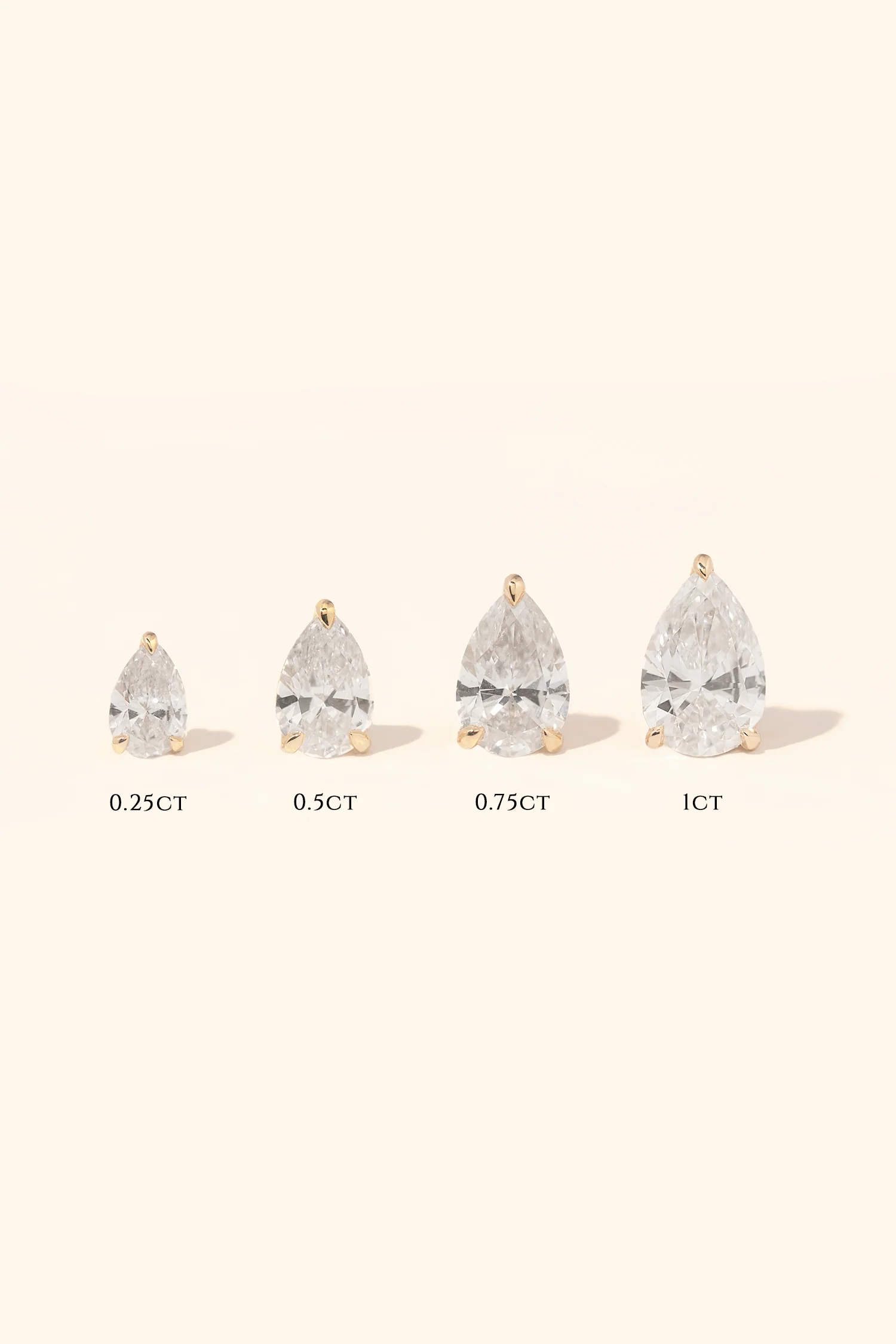 Classic Diamond Studs set with Pear Solitaire - Image 4